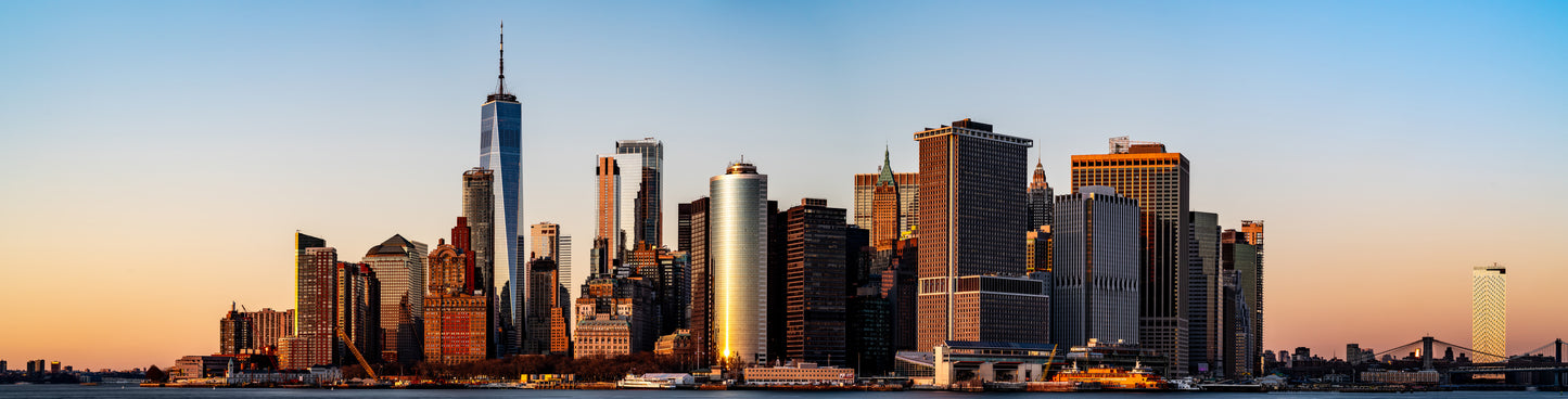 Lower Manhattan panorama red tones on buildings at sunset.jpg