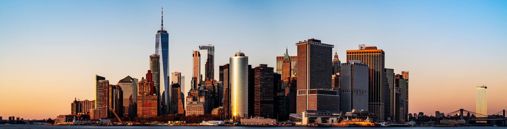 Lower Manhattan panorama red tones on buildings at sunset.jpg