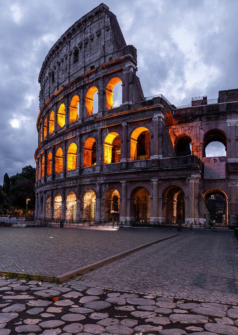 Illuminated Colosseum at sunrise